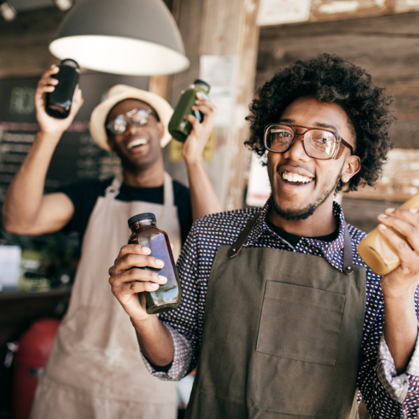 2 men holding their drink fabrication