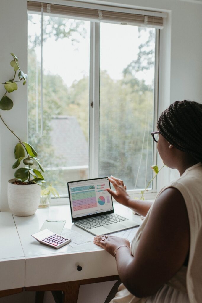 black woman working on laptop